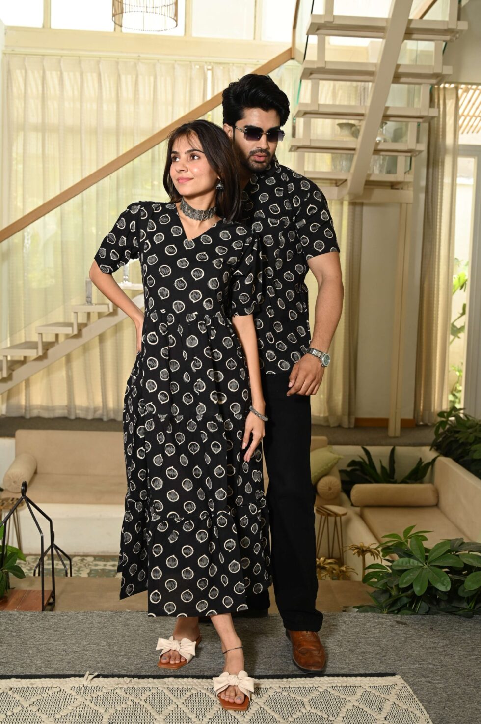 Couple wearing matching black cotton Bagru print Anarkali dress and shirt set