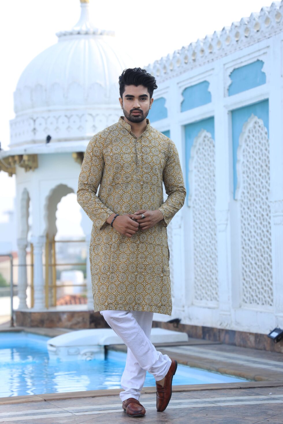 Artisan crafting kurta with precision and love