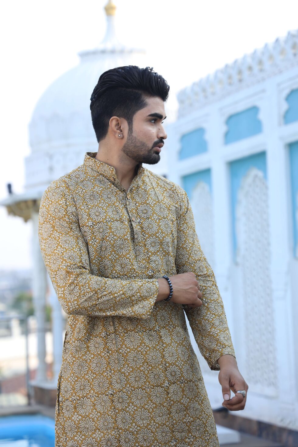 Man wearing handcrafted kurta set with confidence