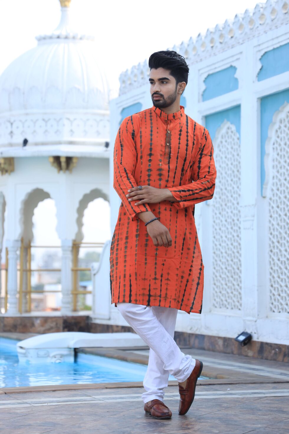Orange printed kurta with traditional Indian motifs