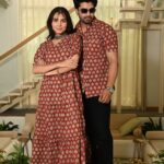 Couple wearing matching Red Cotton Bagru Print Anarkali dress and shirt set