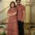 Couple wearing matching Red Cotton Bagru Print Anarkali dress and shirt set