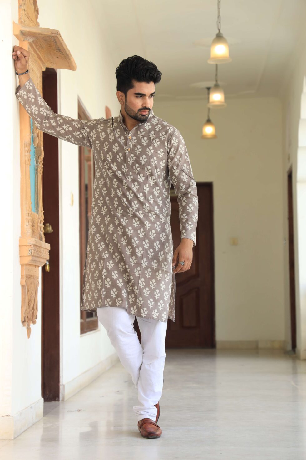 Close-up of intricate printed design on kurta