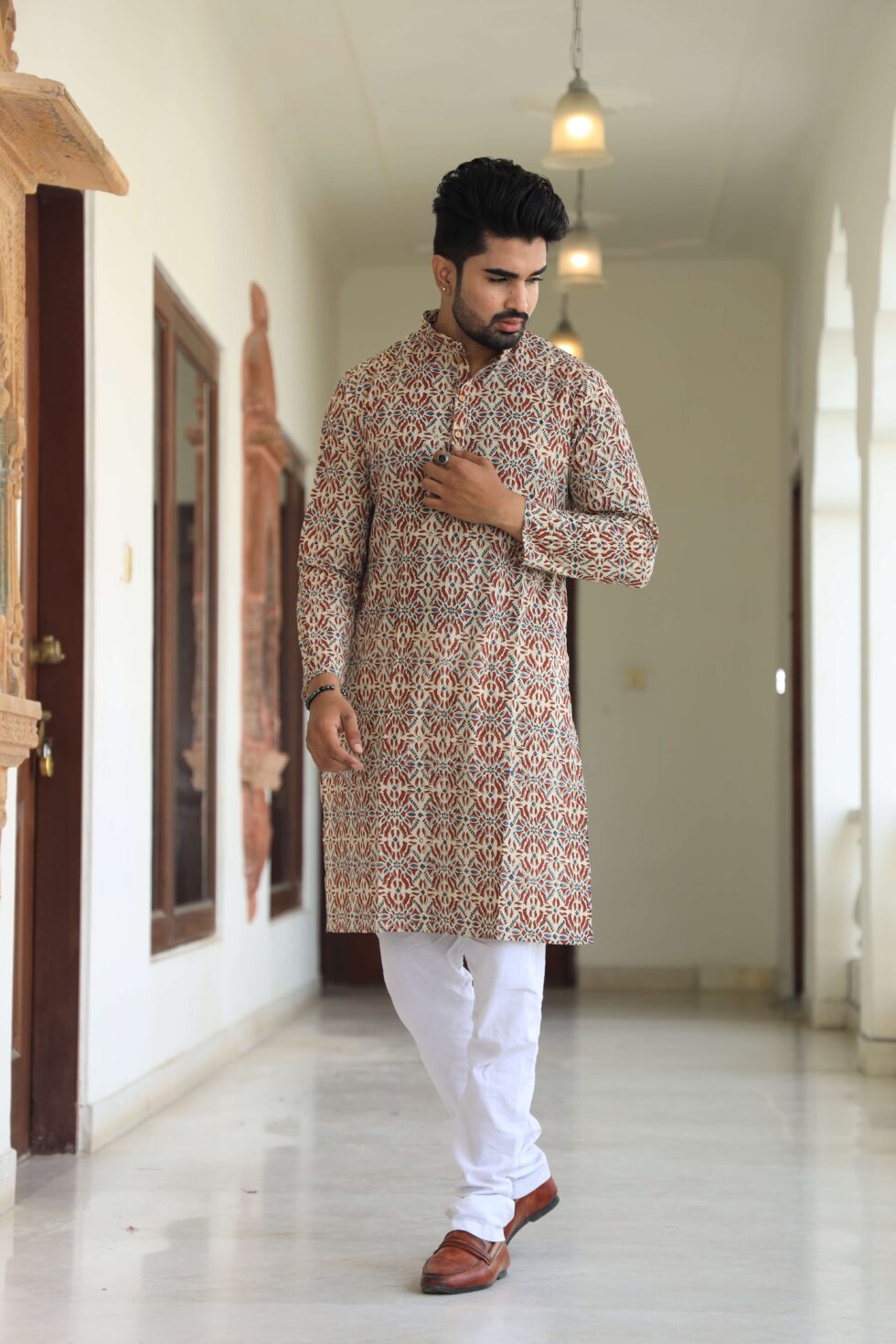 Men's beige kurta set with white pajama and intricate prints