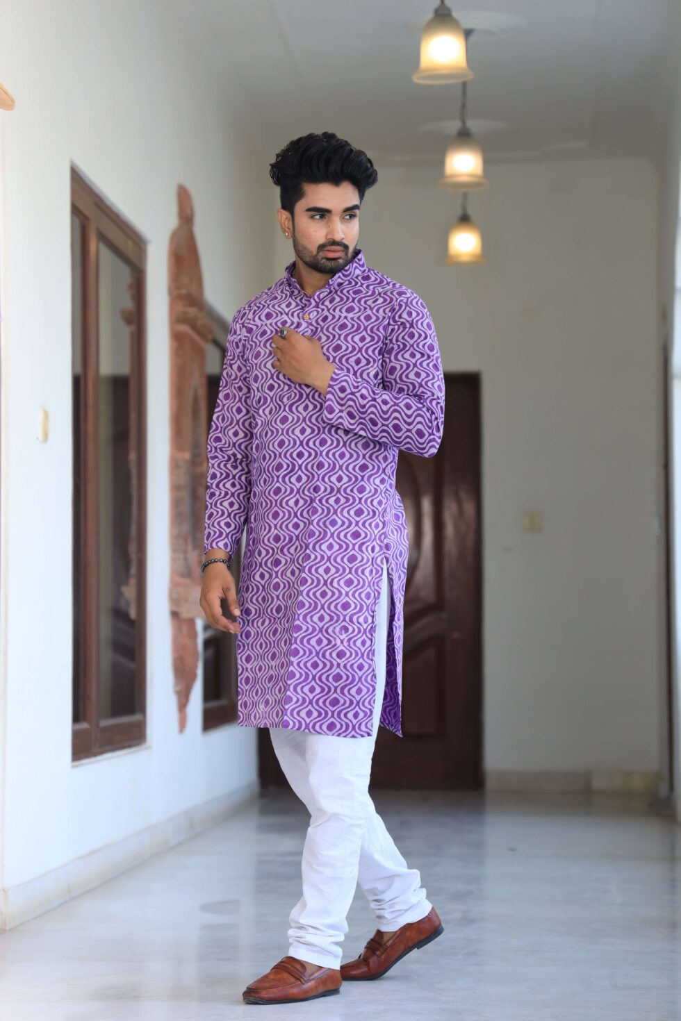 Close-up of kurta set's elaborate patterns and designs